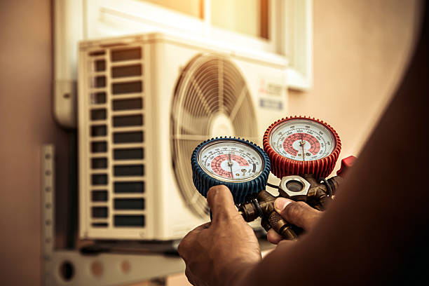 Professional Ac Installation technician working in Valley Falls, RI